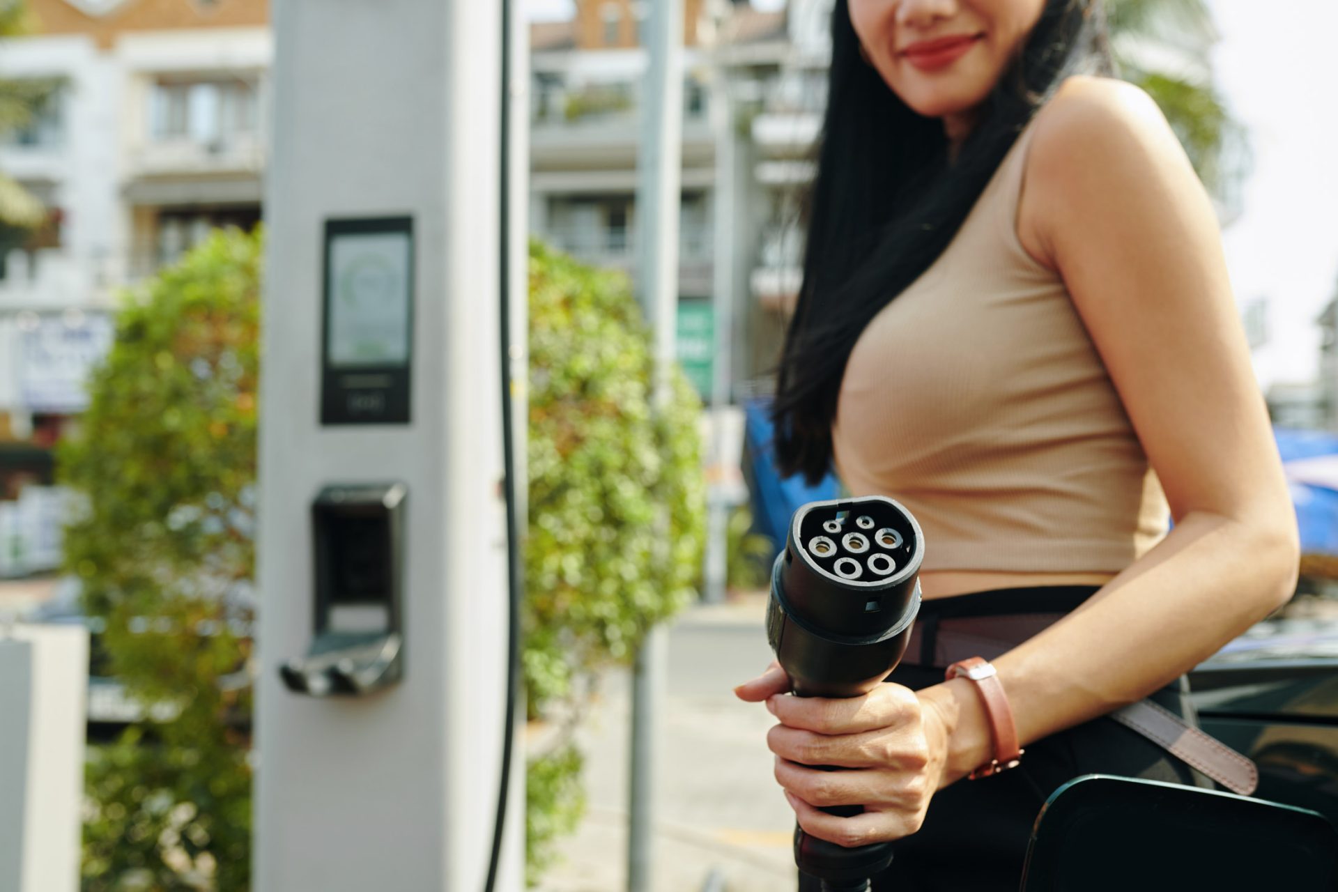 woman holding charging plug 2024 04 22 20 46 15 utc